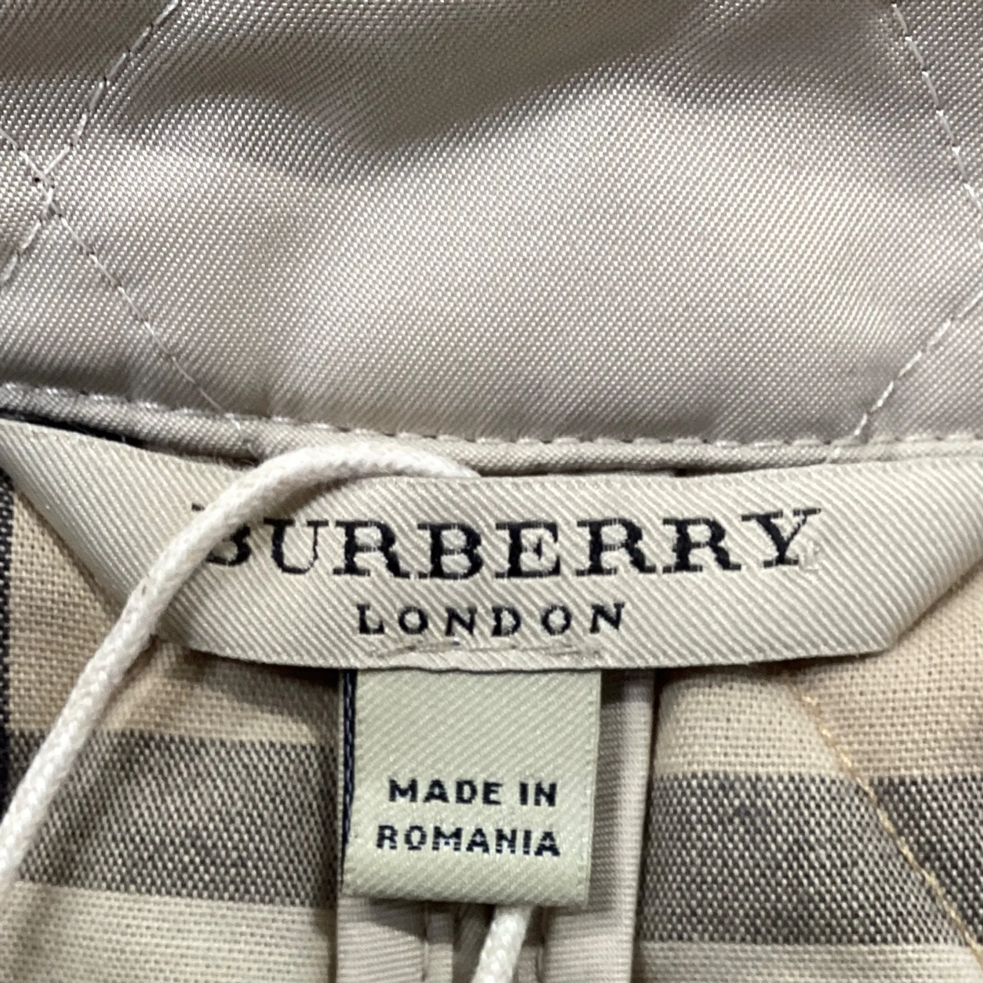 Burberry London Quilted Buttoned Down Jacket in Beige Polyester